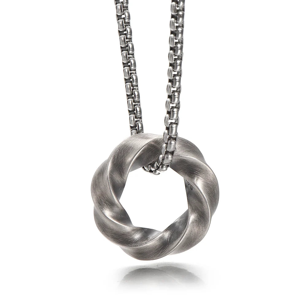 Mobius hoop pendant angled close-up on white background