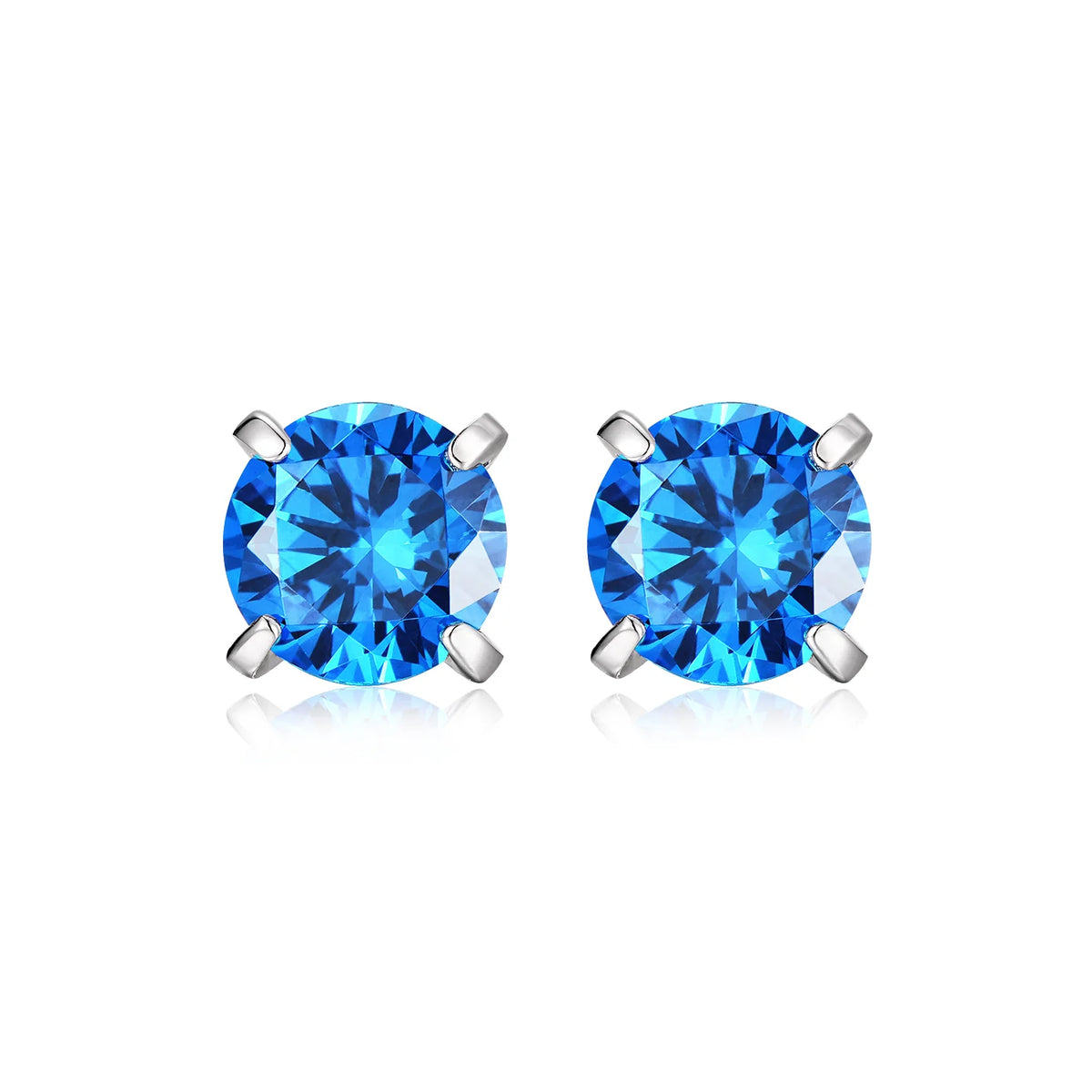 Blue stone sterling silver studs worn profile view