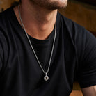 Yellow citrine pendant necklace worn at chest