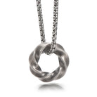 Mobius hoop pendant angled close-up on white background