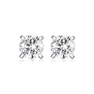 White stone sterling silver studs worn profile view