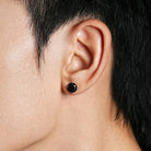 Black cubic zirconia stud earrings scale view