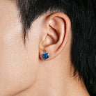 Blue cubic zirconia stud earrings scale view