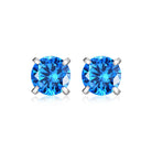 Blue stone sterling silver studs worn profile view