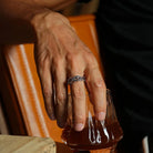 Black iced thorns ring worn on hand